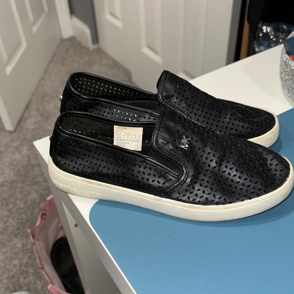 Michael Kors Black Perforated Slip-On Sneakers with White Soles